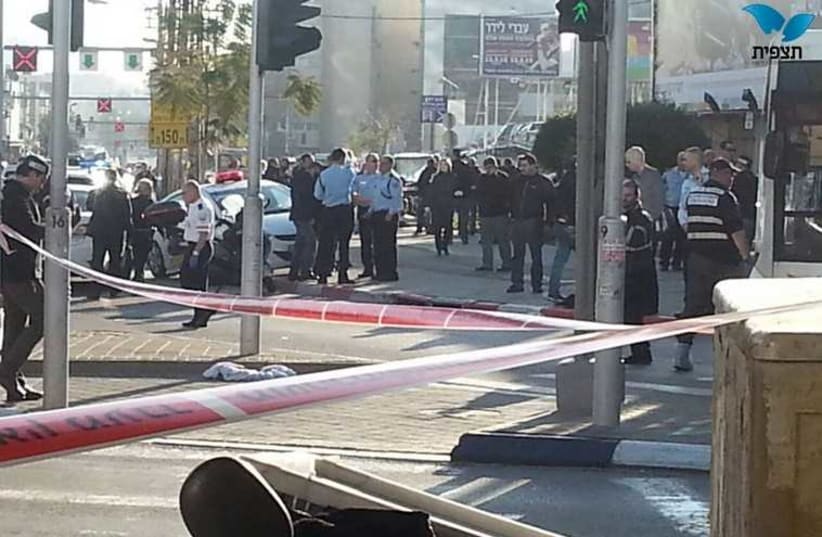 Man stabs passengers on the 40 bus line, near Tel Aviv's Maariv junction, January 21  (photo credit: TAZPIT)