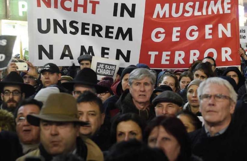 ‘Muslims against terror’ demonstrate in Hamburg, January 12. (photo credit: FABIAN BIMMER / REUTERS)