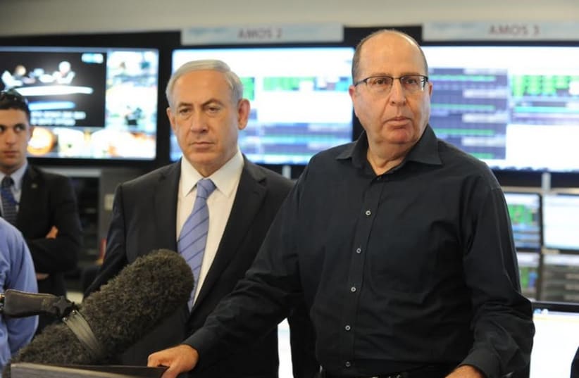 Moshe Ya'alon  and Prime Minister Benjamin Netanyahu visit Israel Aerospace Industries‏. (photo credit: AVSHALOM SASSONI)