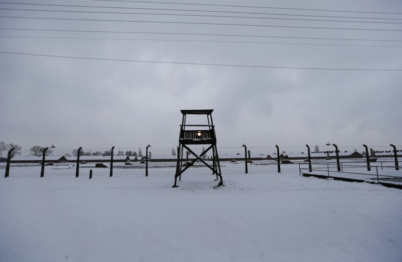 A guard tower is seen at the former German Nazi concentration and extermination camp Auschwitz-Birkena. (photo credit: REUTERS)
