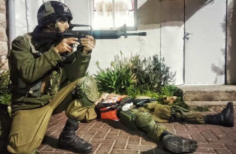 Soldiers in the Tavor battalion during a training exercise. (photo credit: IDF SPOKESPERSON'S UNIT)