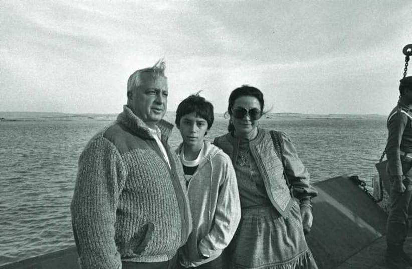 Ariel Sharon, then defense minister, with his wife Lily and their son, Gilad, while visiting the Suez Canal area in Egypt on January 19, 1982 (photo credit: GPO/REUTERS)