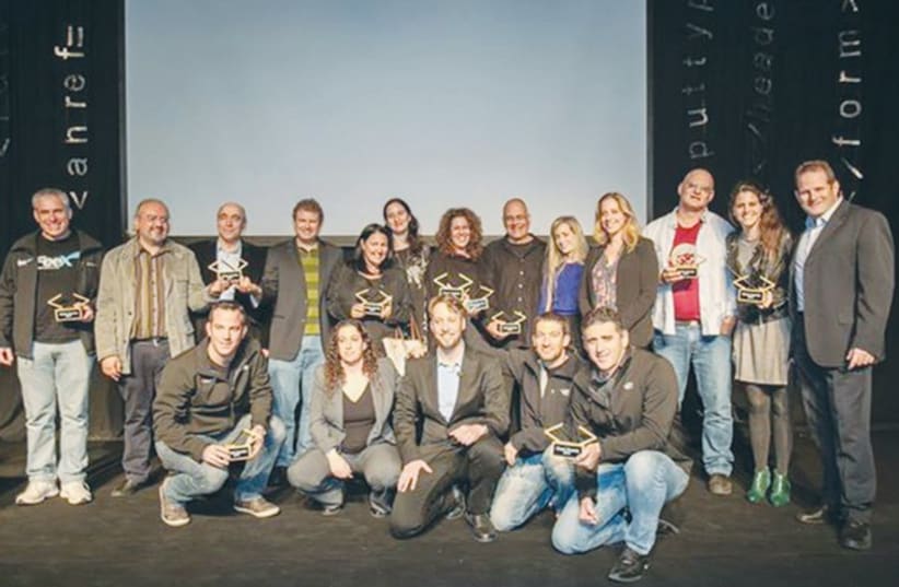 THE WINNERS of the 2014 Geek Awards for Israel’s best startups pose for a group picture at last week’s ceremony in Tel Aviv. (photo credit: Courtesy)