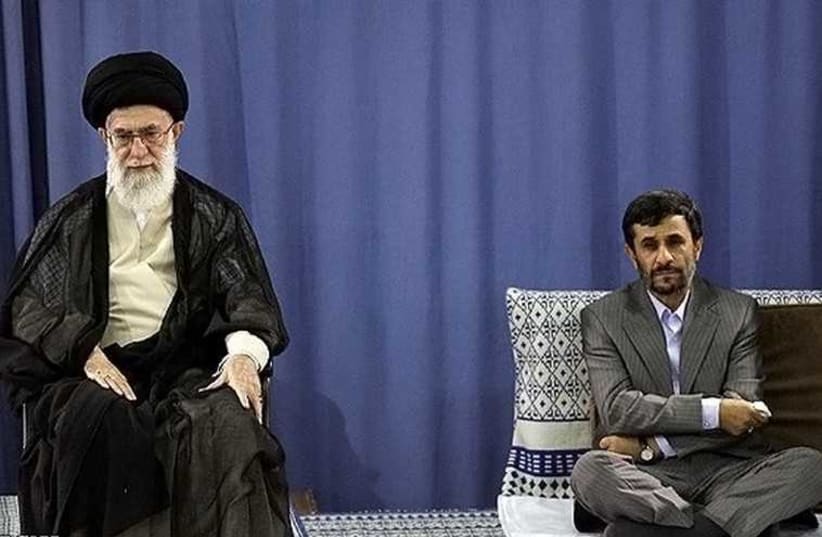 Iranian Supreme Leader Ayatollah Ali Khamenei (left) sits above former president of Iran Mahmoud Ahmadinejad (photo credit: IRANIAN MEDIA)