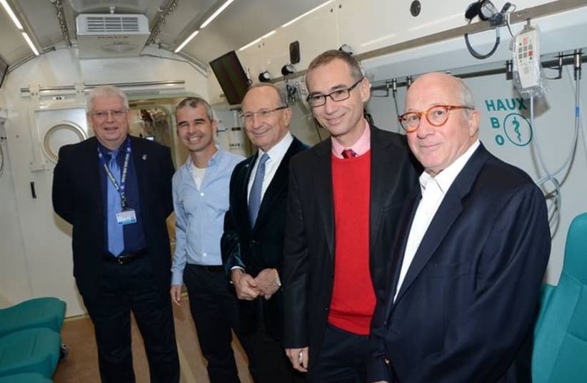 Yitzhak Sagol, Health Ministry d-g Prof. Arnon Afek, Donor Sami Sagol, Dr. Shai Efrati and Dr. Benny Davidson. (photo credit: AVIV HOFI)