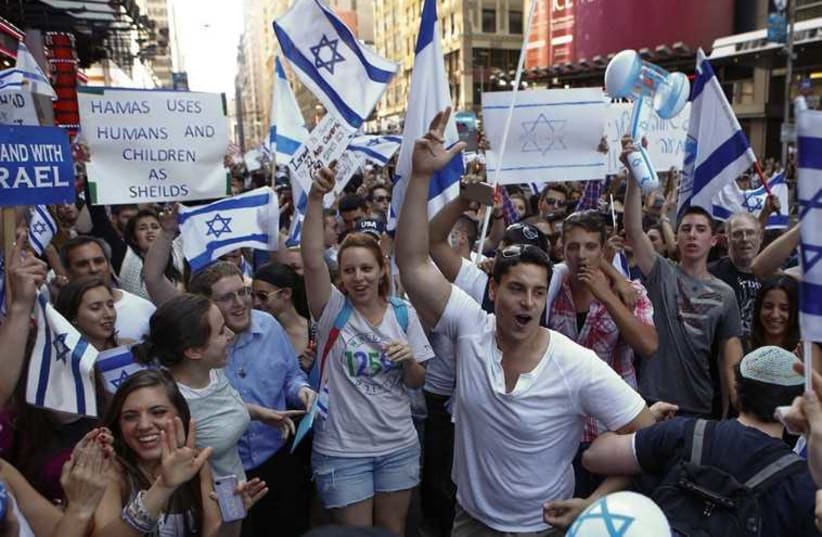 Young Jews rally in support of Israel in New York, July 20. (photo credit: EDUARDO MUNOZ / REUTERS)