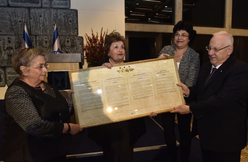 Left to right: President Reuven Rivlin, Shirly Shavit, director of Na'amat International Department, Masha Lubelski, Na'amat representative of the World Zionist Organization and First Lady Ruhama Rivlin. (photo credit: ISRAEL MALOVANI)