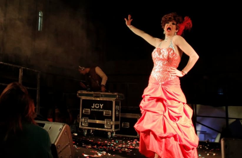 A drag queen performs on stage before the Drag Race in central Jerusalem, February 16, 2015. (photo credit: REUTERS)