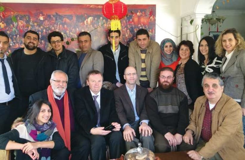 The inaugural class of Palestinian PhD candidates and the German professors embarking on the program. Prof. Mohammed Dajani Daoudi is bottom, second from left. (photo credit: Courtesy)