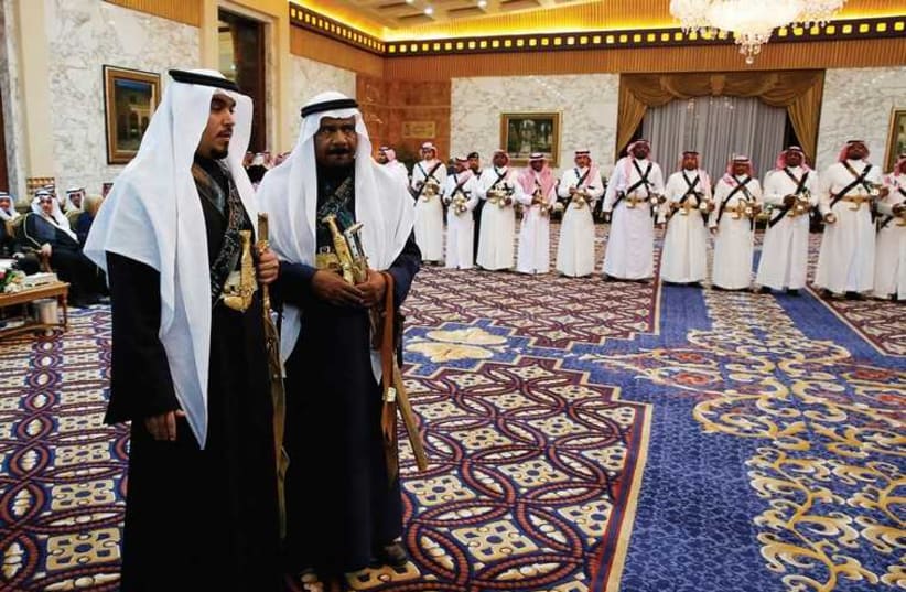 MEMBERS OF the palace staff stand in waiting during Saudi Arabia’s King Salman’s meeting with US President Barack Obama at Erga Palace in Riyadh in January (photo credit: REUTERS)