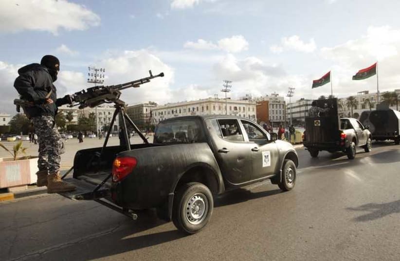 Libyan police in Tripoli (photo credit: REUTERS)
