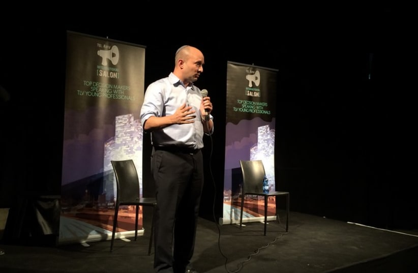 Naftali Bennett speaking at a Tel Aviv International Salon event (photo credit: Lahav Harkov)