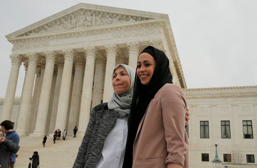 Samantha Elauf (R), who was denied a sales job at an Abercrombie Kids store in Tulsa in 2008, stands with her mother Majda outside the US Supreme Court in Washington (photo credit: REUTERS)