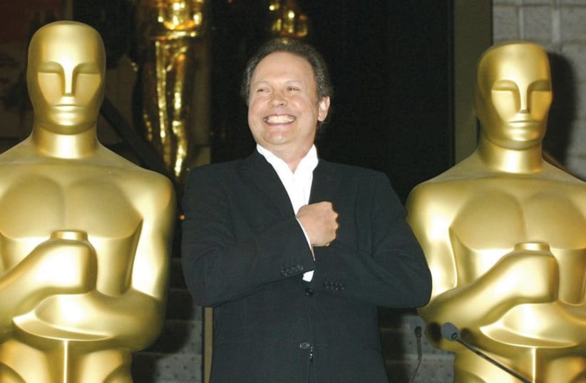 FEW PEOPLE have more experience hosting the Academy Awards than actor Billy Crystal, who was the master of ceremonies nine times (photo credit: REUTERS)