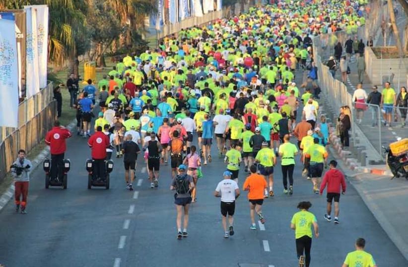 Tel Aviv Marathon participants run the race in 2014 (photo credit: MAGEN DAVID ADOM)