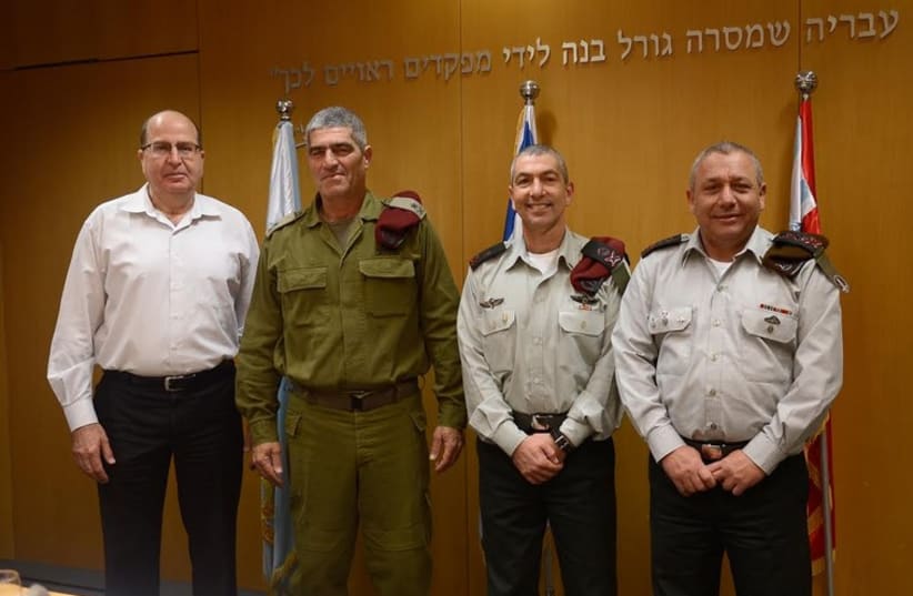 From right to left: IDF chief of staff Gadi Eisenkot, Maj.-Gen. Roni Numa, Maj.-Gen. (res.) Tal Russo, Defense Minister Moshe Ya'alon (photo credit: IDF SPOKESMAN’S UNIT)