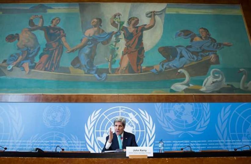  US Secretary of State John Kerry gestures during a news conference after he delivered remarks to the United Nations Human Rights Council in Geneva March 2 (photo credit: REUTERS)