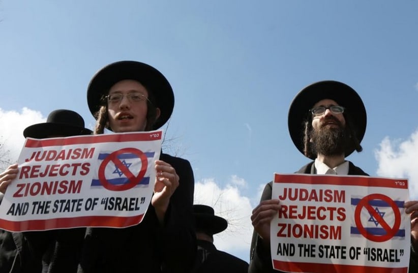 Dozens of haredim gathered in front of the US Consulate-General in Jerusalem on Tuesday to protest against Zionism and Prime Minister Benjamin Netanyahu’s speech before Congress. (photo credit: MARC ISRAEL SELLEM)
