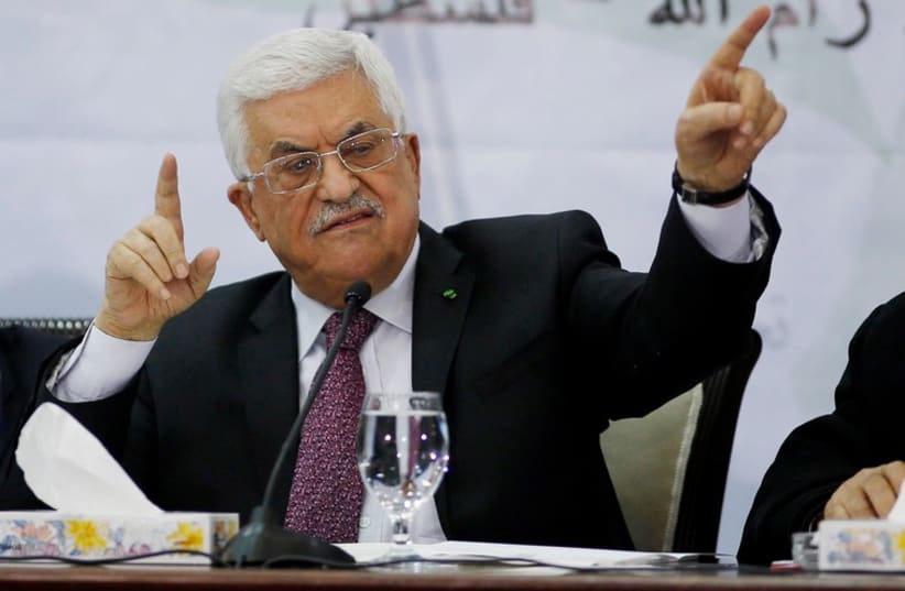 PA President Mahmoud Abbas (C)  at a meeting for the Central Council of the PLO, in Ramallah, March 4, 2015 (photo credit: REUTERS)