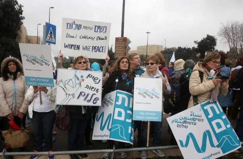 Members of Women Wage Peace gather in the capital from across the country to protest stalled peace negotiations, March 4, 2015 (photo credit: MARC ISRAEL SELLEM/THE JERUSALEM POST)