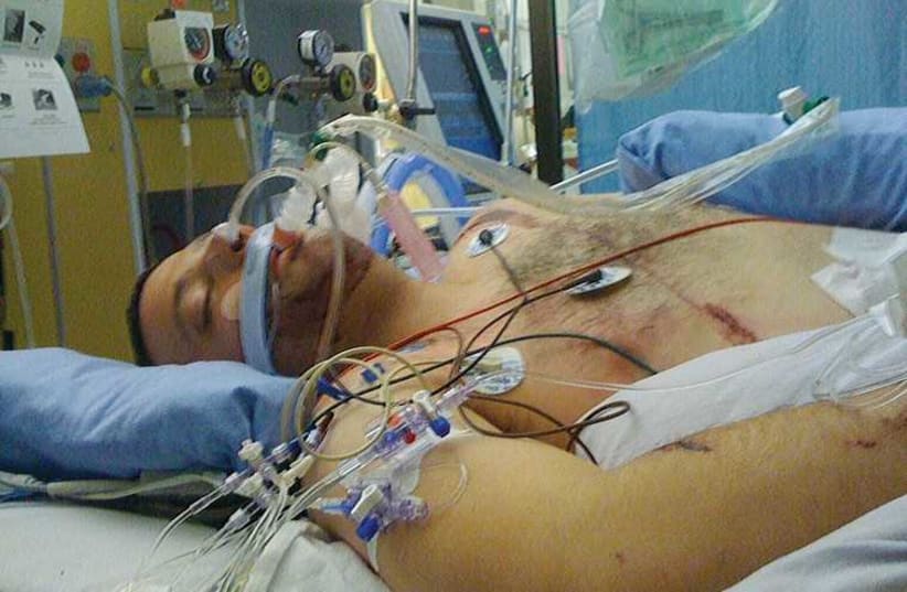 Erez Avramov recovers in the hospital after a car accident nearly took his life. (photo credit: Courtesy)