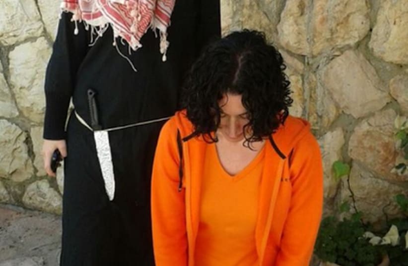 Bayit Yehudi candidate Anat Roth dresses as Islamic State victim for Purim  (photo credit: FACEBOOK)