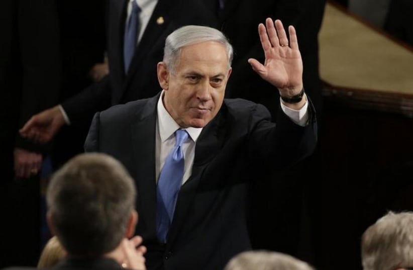 Prime Minister Benjamin Netanyahu gestures during his appearance before Congress (photo credit: REUTERS)