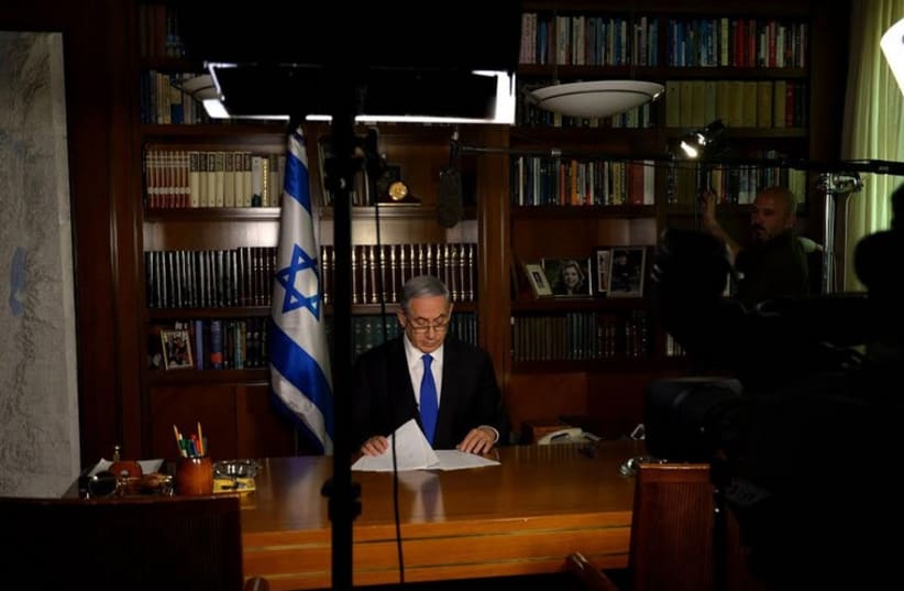 Prime Minister Benjamin Netanyahu preparing for an interview with CBS's Face the Nation (photo credit: GPO)