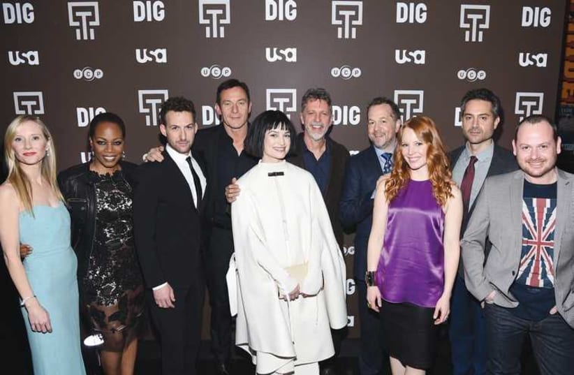 The cast of ‘Dig’ with executive producers Tim Kring (center) and Gideon Raff (far right) at the TV series premiere in New York (photo credit: Courtesy)