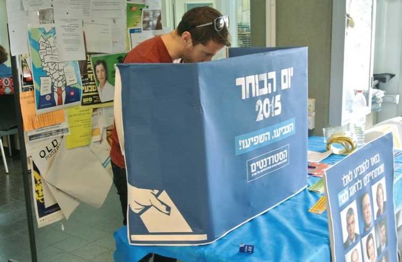 A STUDENT ‘VOTES’ at Tel Aviv University yesterday (photo credit: TAU STUDENT UNION)