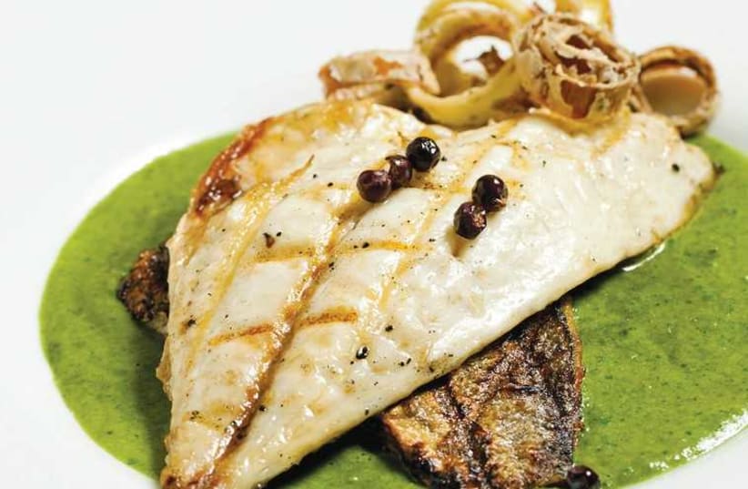 Seared fillet of mullet on cream of spinach (photo credit: BOAZ LAVI)