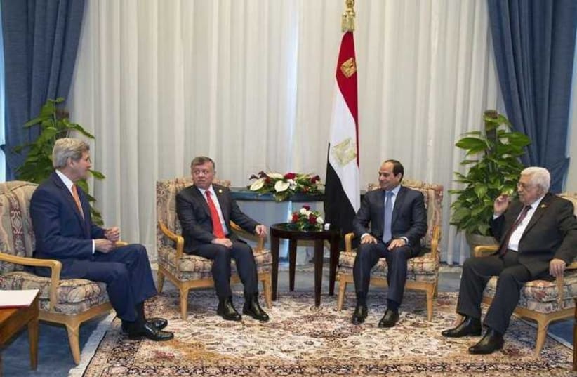 US Secretary of State John Kerry, Jordanian King Abdullah, Egyptian President Abdel Fattah al-Sisi and Palestinian President Mahmoud Abbas meet on March 13, 2015. (photo credit: REUTERS)