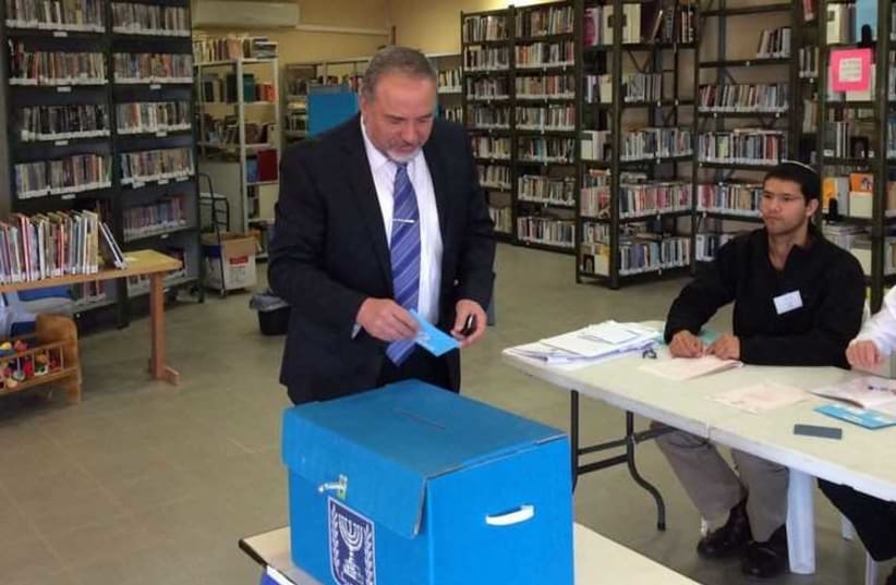 Avigdor Liberman votes in general elections (photo credit: COURTESY YISRAEL BEYTENU)