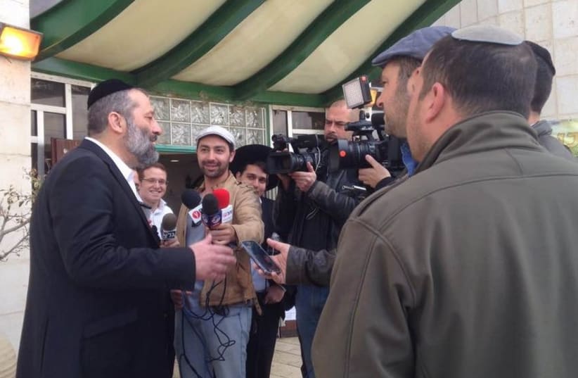 Shas Chairman Aryeh Deri speaks to the press at the ballot (photo credit: JEREMY SHARON)