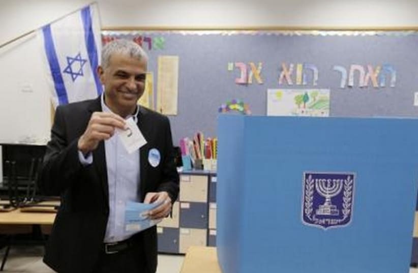 Kulanu leader Moshe Kahlon casts vote in  Haifa (photo credit: REUTERS)