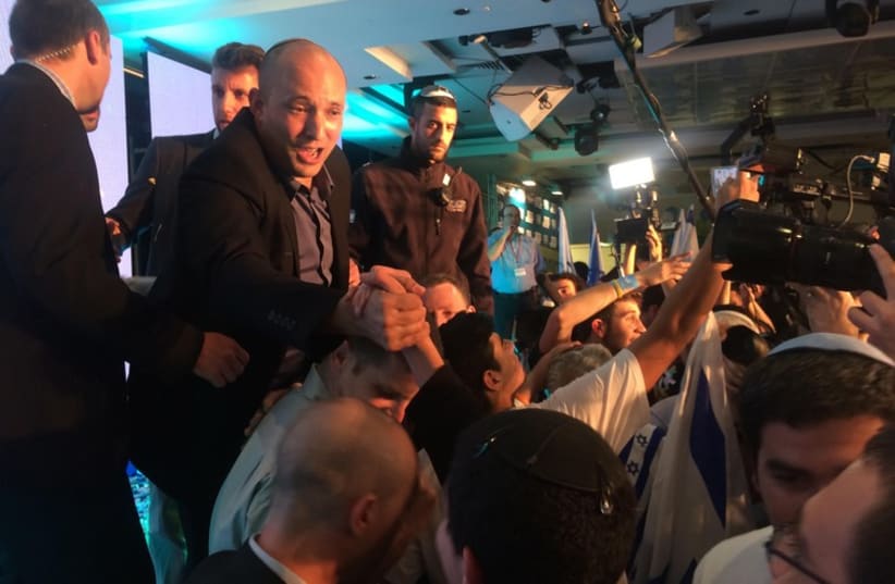 Naftali Bennett greets Bayit Yehudi supporters after the election results were announced (photo credit: SAM SOKOL)
