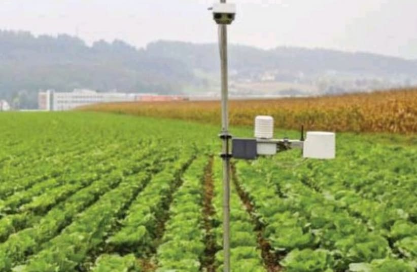 AGROLAN KNOWLEDGE and Input Ltd. displays their new advanced camera system that enables agriculturalists to monitor growth in their fields remotely, transmitting images to a dedicated website. (photo credit: Courtesy)
