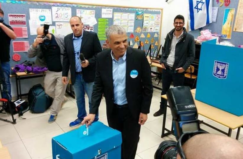 Moshe Kahlon votes at a ballot box in his native Givat Olga (photo credit: FACEBOOK)