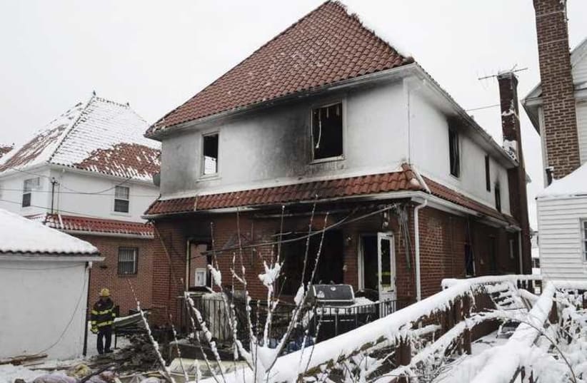Aftermath of a home fire in the Midwood neighborhood of Brooklyn, New York March 21, 2015, which left seven children dead.  (photo credit: REUTERS)