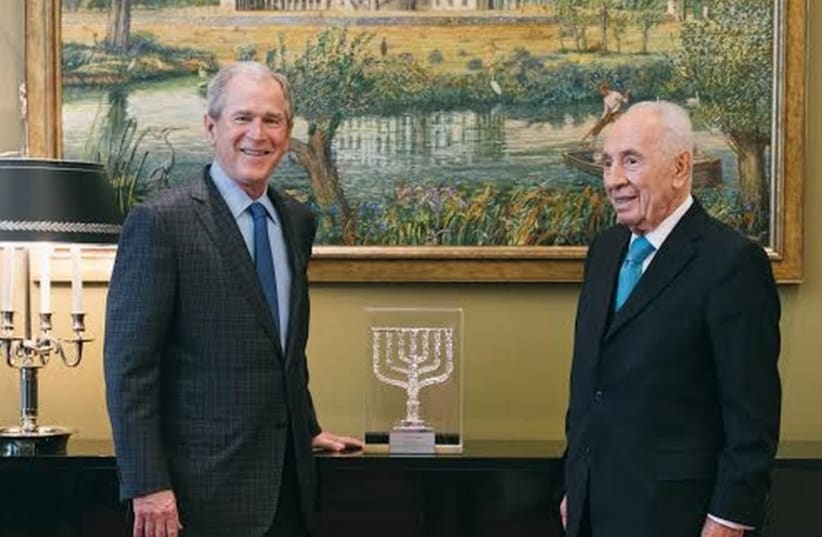 George W, Bush (left) with Shimon Peres (photo credit: PR)