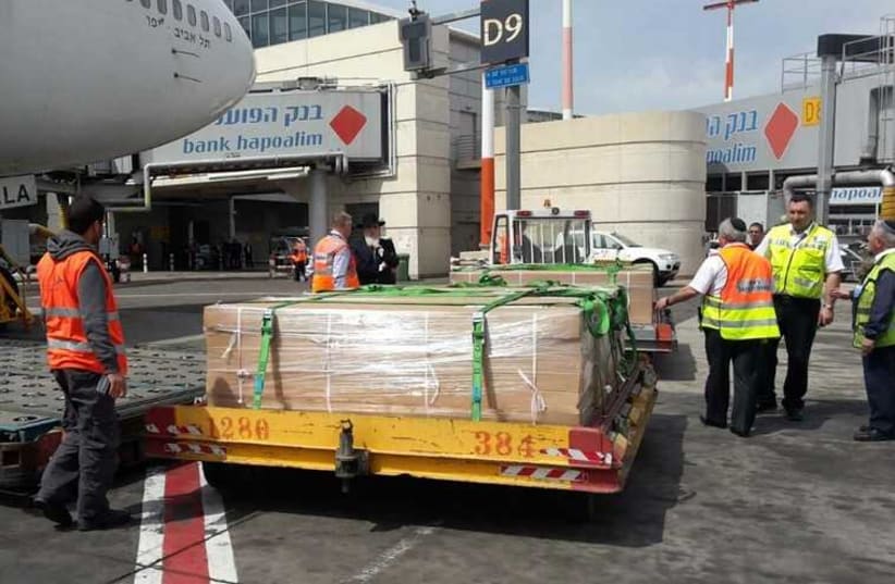 Coffins of Brooklyn fire victims arrive in Israel for burial (photo credit: ISRAEL AIRPORTS AUTHORITY)