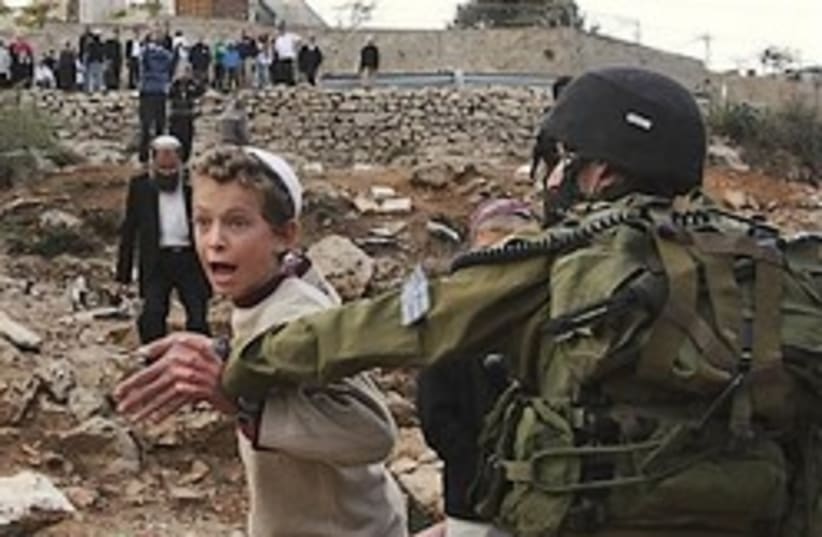 settler kid clash with IDF 248 ap (photo credit: AP)