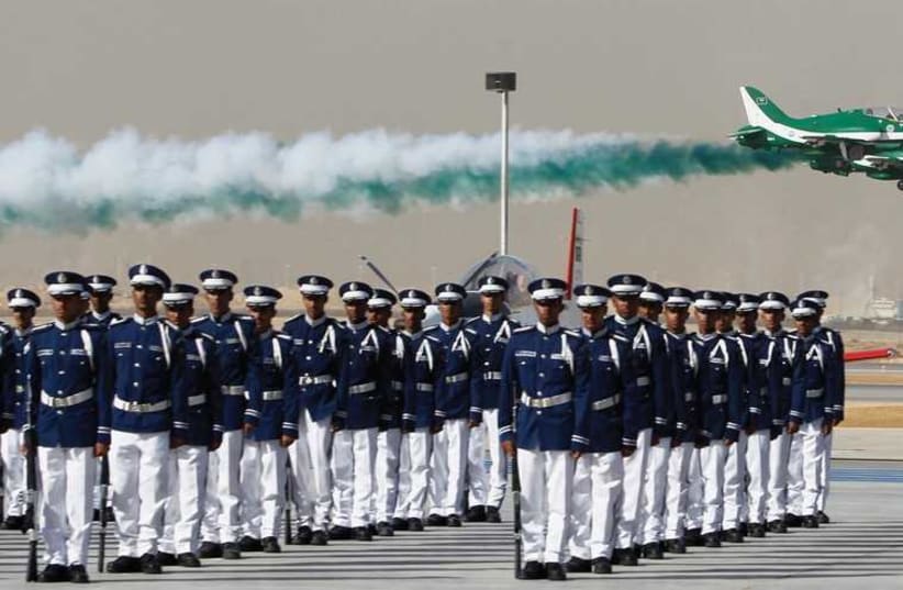 ROYAL SAUDI Air Force jets fly in formation during a graduation ceremony for air force officers at King Faisal Air Academy in Riyadh in January. (photo credit: REUTERS)