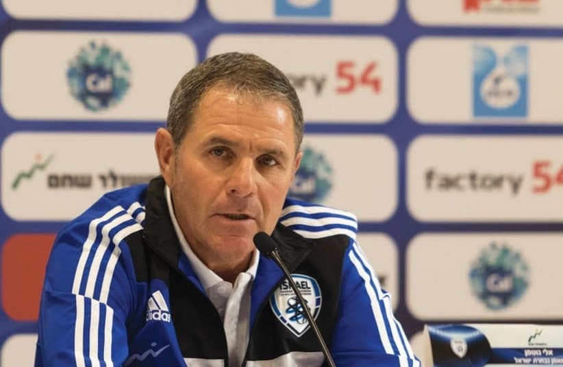 Israeli national soccer team coach Eli Gutman speaks to reporters (photo credit: ERAN LUF)