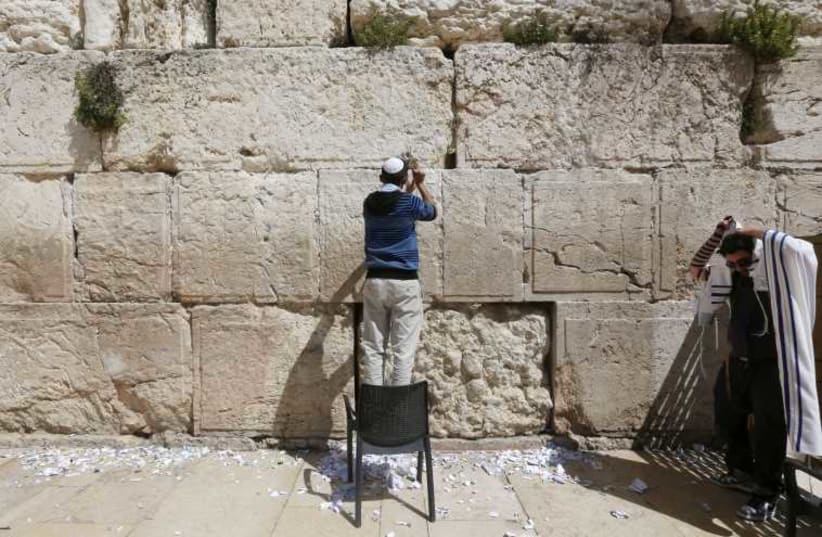 Western Wall cleaned for Passover. (photo credit: MARC ISRAEL SELLEM/THE JERUSALEM POST)