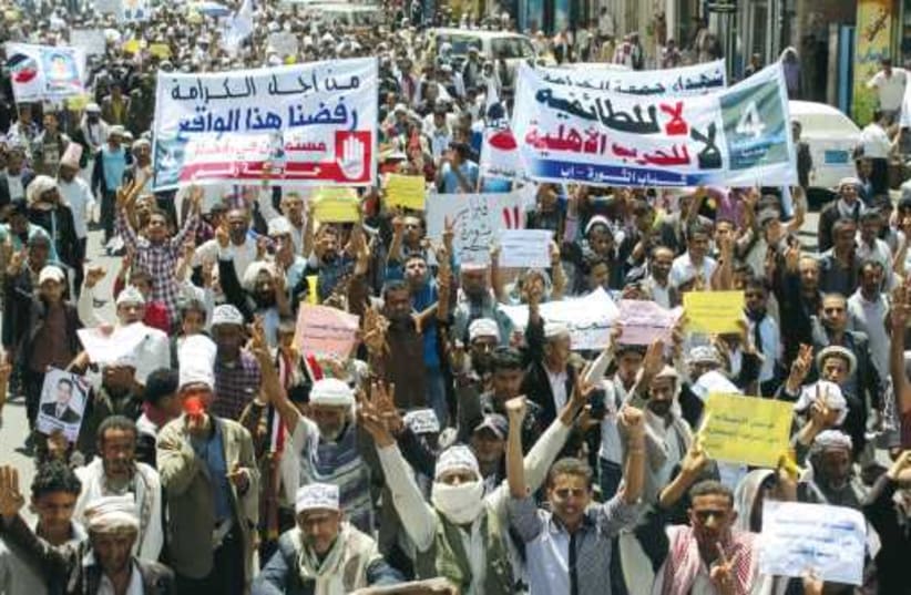 Anti-Houthi protesters demonstrate in Ibb, Yemen, on March 21. (photo credit: REUTERS)