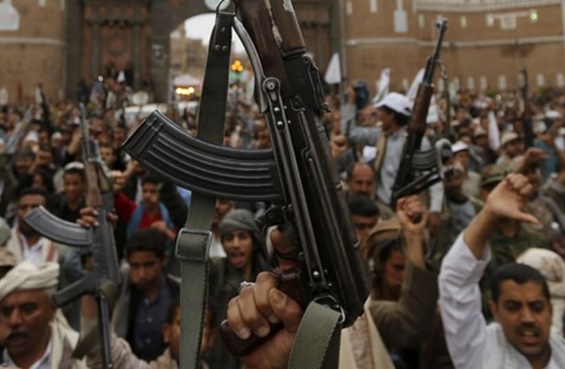 Shi'ite Muslim rebels in Sanaa, Yemen, March 26, 2013 (photo credit: REUTERS)