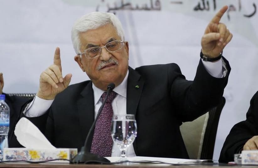 Palestinian Authority Chairman Mahmoud Abbas gestures as he speaks during a meeting for the Central Council of the Palestinian Liberation Organization in Ramallah (photo credit: REUTERS)
