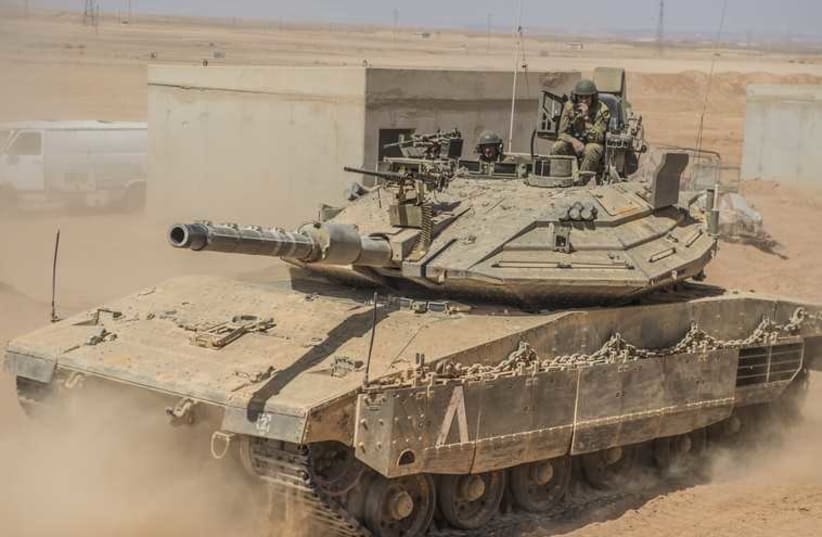 Infantry commanders ride in tanks as part of new war training (photo credit: IDF SPOKESPERSON'S UNIT)