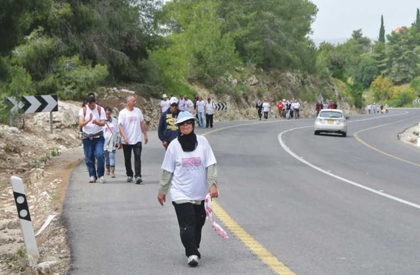 SUPPORTERS OF Beduin rights approach Abu Ghosh  on march to Jerusalem (photo credit: SETH J. FRANTZMAN)